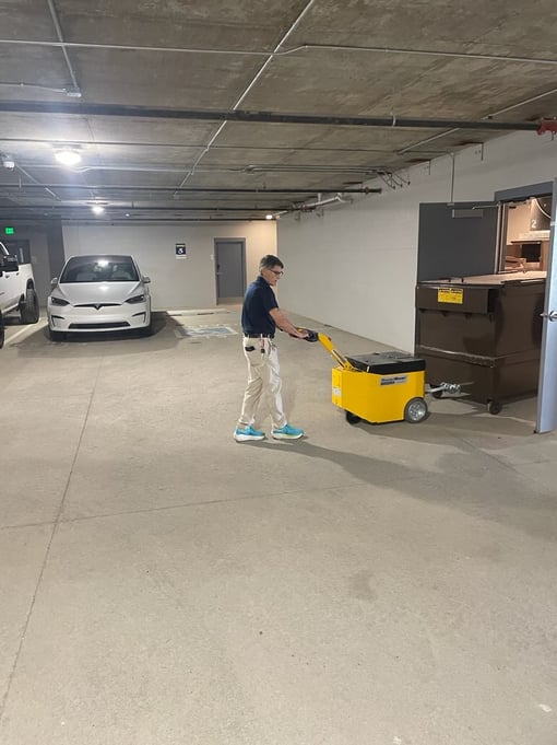 dumpster caddy in residential building