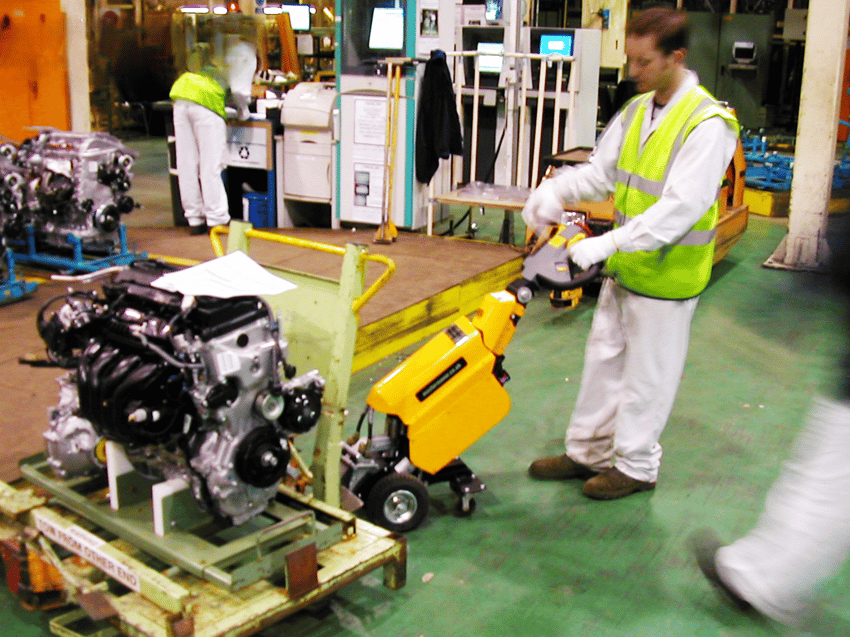 electric tug moving components in automotive manufacturing