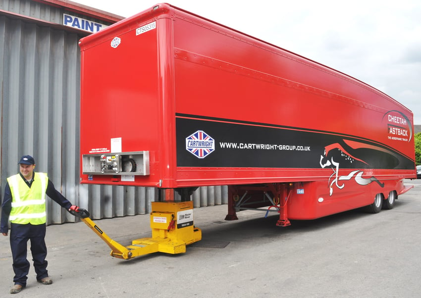 Using an electric trailer moving system to move heavy trailer 