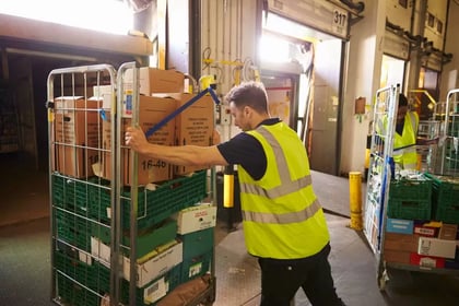 Manual handling of a roll cage