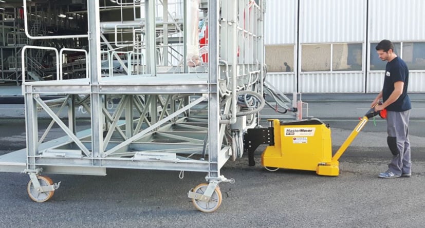MasterTug moving a staging platform in aerospace