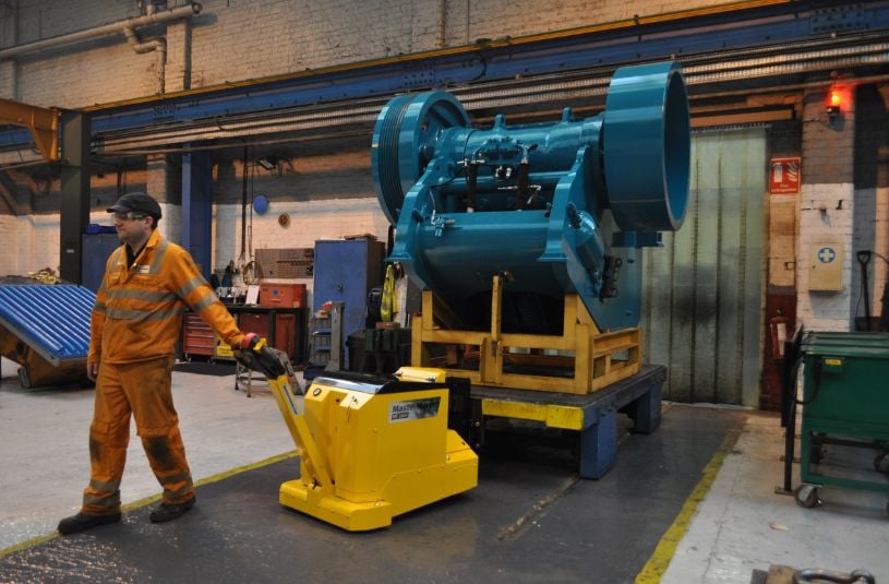 MasterTug MT1500 moving a rock crusher component