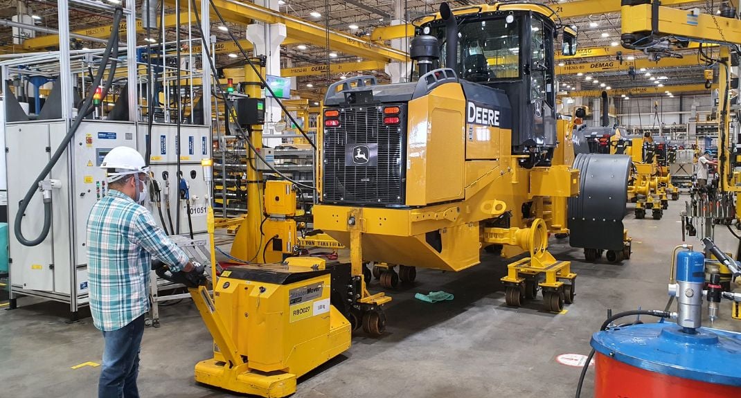 MasterTug MT1500 moving heavy plant machinery through production for John Deere, Brazil