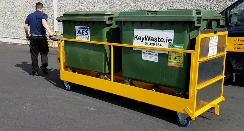 SmartMover SM100+ moving 2 commercial bins on a bin moving trolley