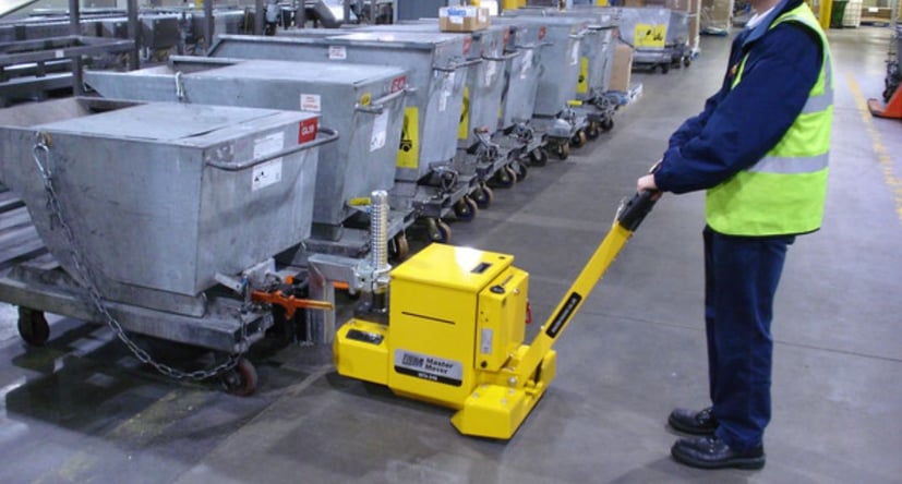 MasterTug moving stainless steel totes in beverage production