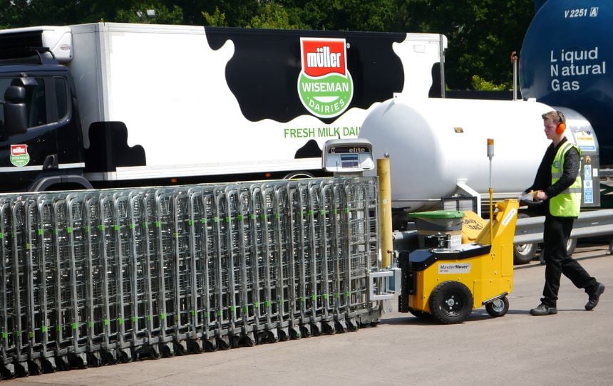 AllTerrain ATP400 moving nested roll cages outside a dairy processing plant