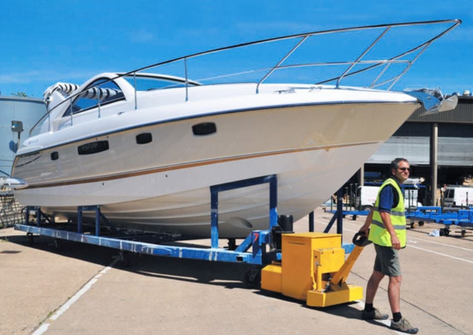 MasterTug moving a yacht in a manufacturing yard