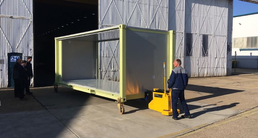 MasterTug moving a prefabricated building frame for construction