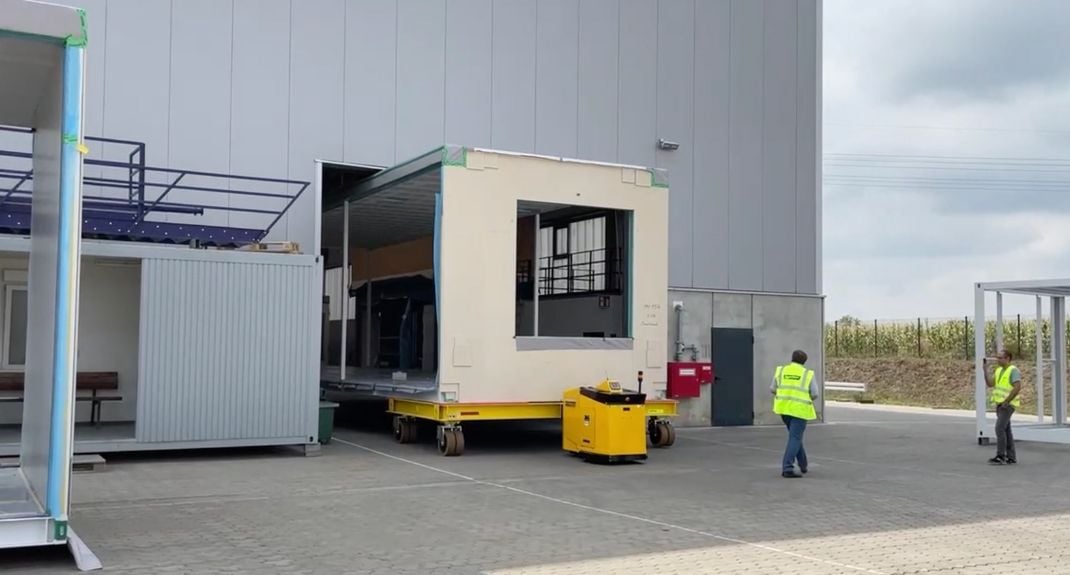 PowerSteered PS3000+ moving a modular building for construction
