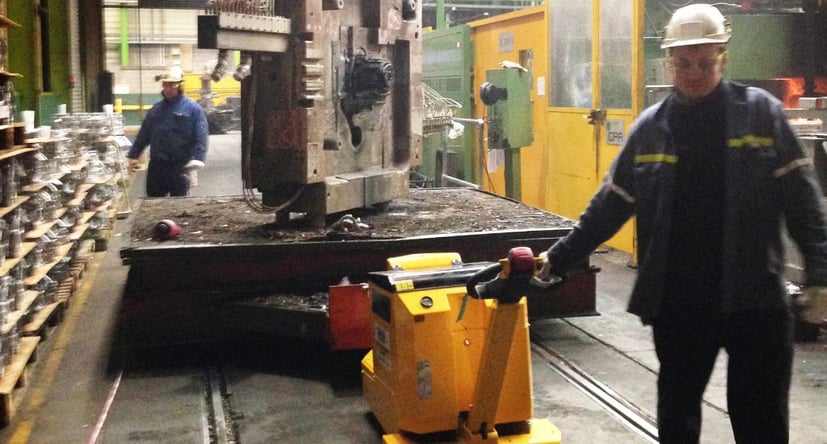 MasterTug MT1500+ moving steel components on rails