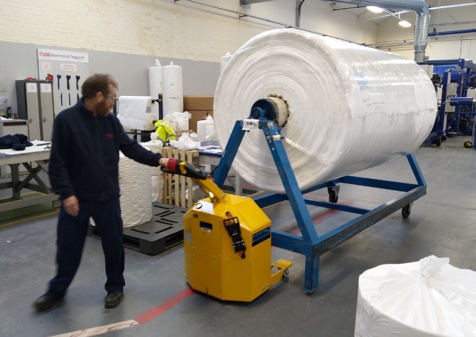 MasterHandler moving a large textile reel