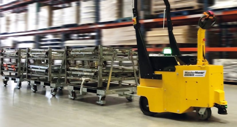 AGV300 TOW moving nested cages through a warehouse