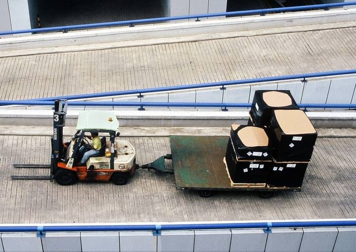 Forklift towing a load