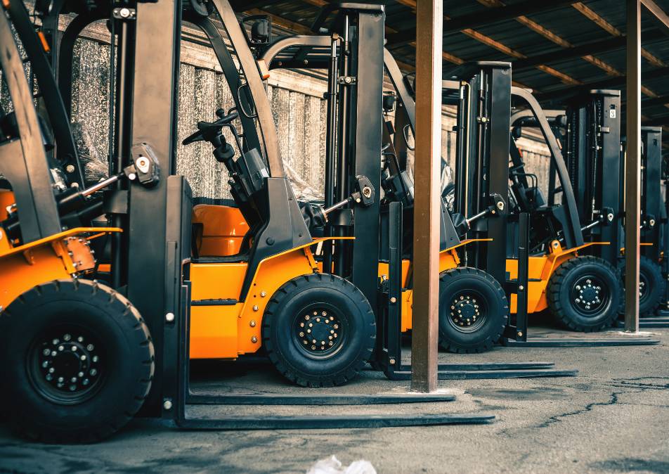 Line of forklift trucks